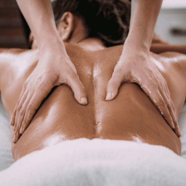 Patient enjoying professional massage therapy at Restoracare Health