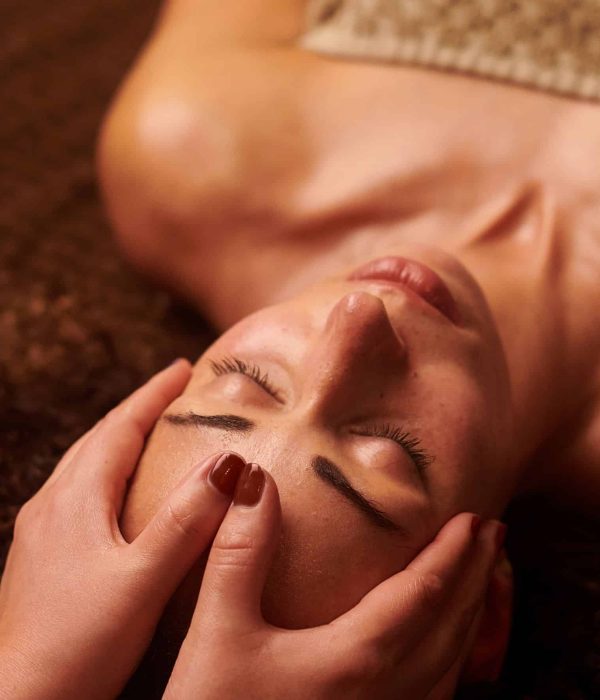 relaxing facial massage on a woman